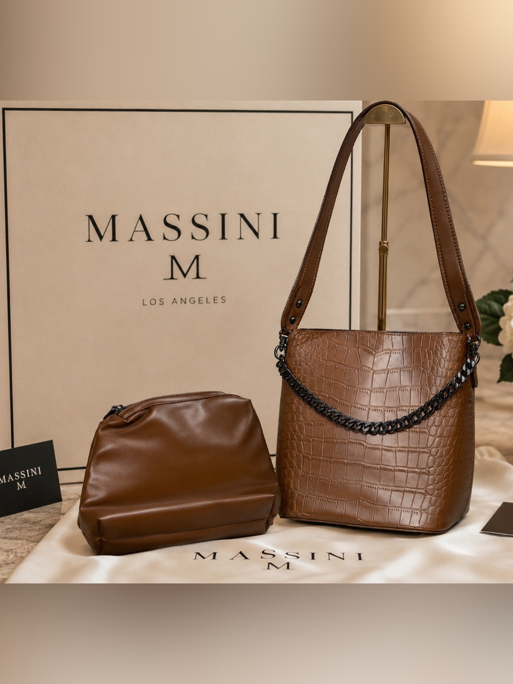 Massini Croc-Embossed Vegan Leather Bucket Bag with a matching inner pouch.